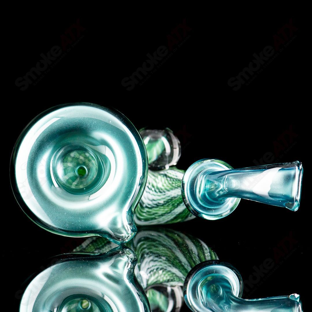 JMass Sherlock glass pipe from the Neptunium Sherlock Collab featuring clear glass and intricate design details.
