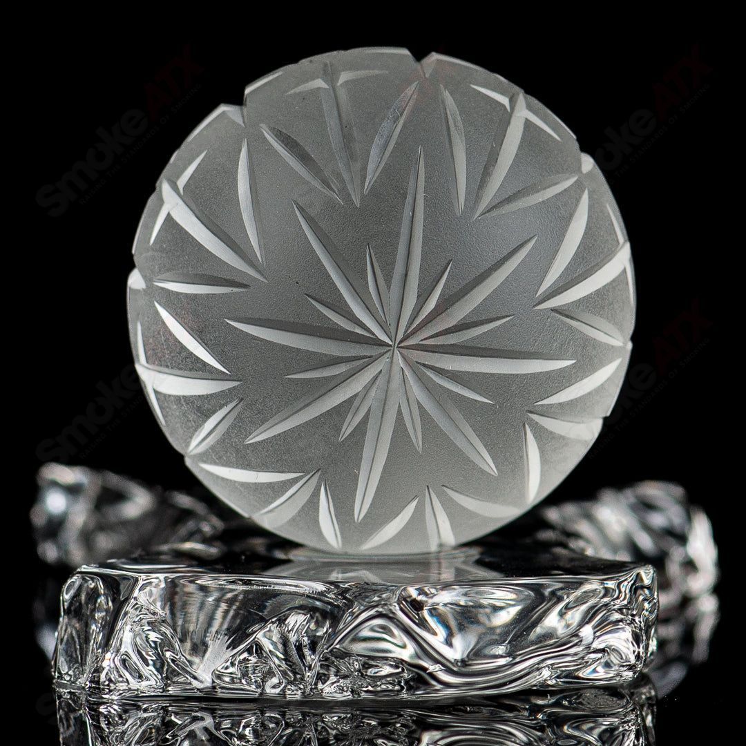 Faceted Snowflake Marble by Fatal Facets, handcrafted heady glass marble with intricate snowflake design, vibrant colors, and smooth surface.