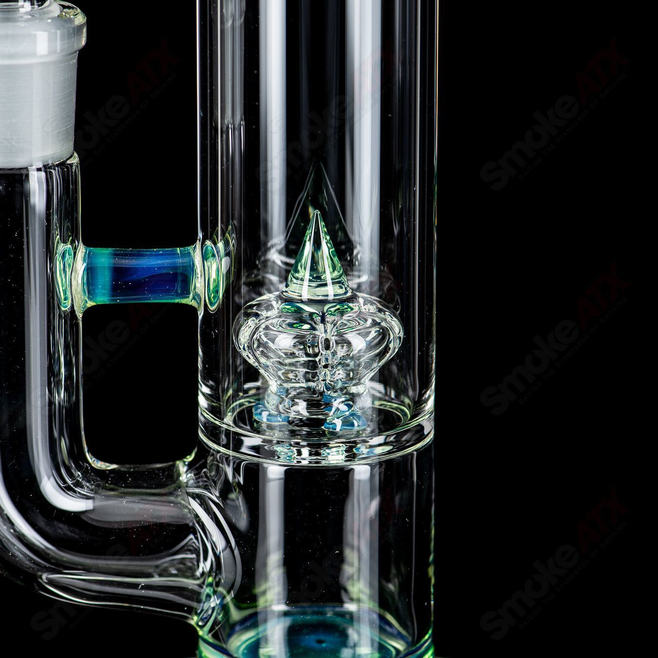 Heady glass piece called PA Egyptian Green Imperial with Millie design by Sovereignty Glass, featuring vibrant green accents.