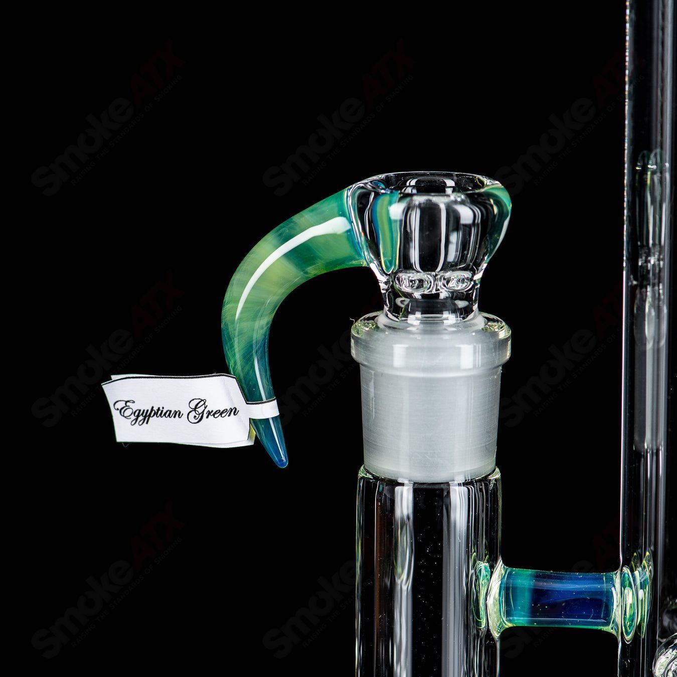 Heady glass pipe in Egyptian Green Imperial design with Millie pattern by Sovereignty Glass, showcasing detailed craftsmanship.