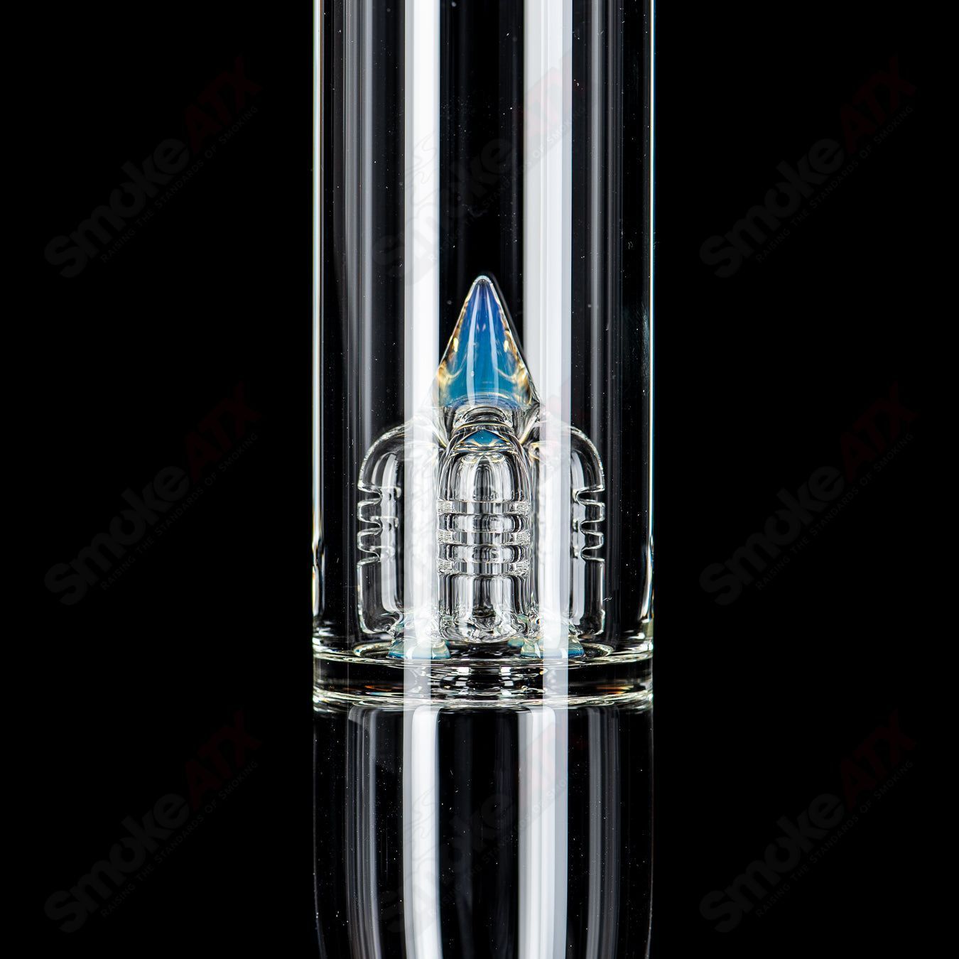 Heady glass bong with four arms and reduction by Sovereignty Glass, featuring intricate glasswork and a clear, sturdy design.
