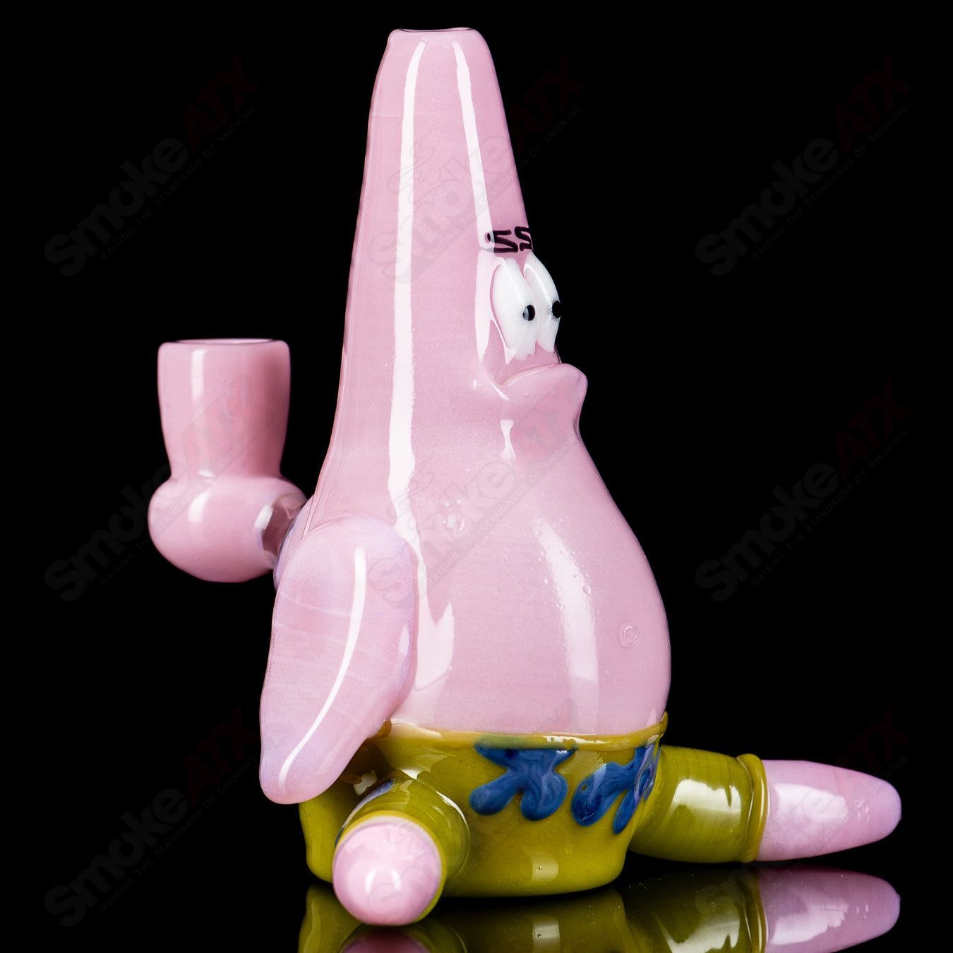 Hendy Patrick Rig glass concentrate rig with intricate colorful designs and a sturdy base, designed for dabbing and concentrates.