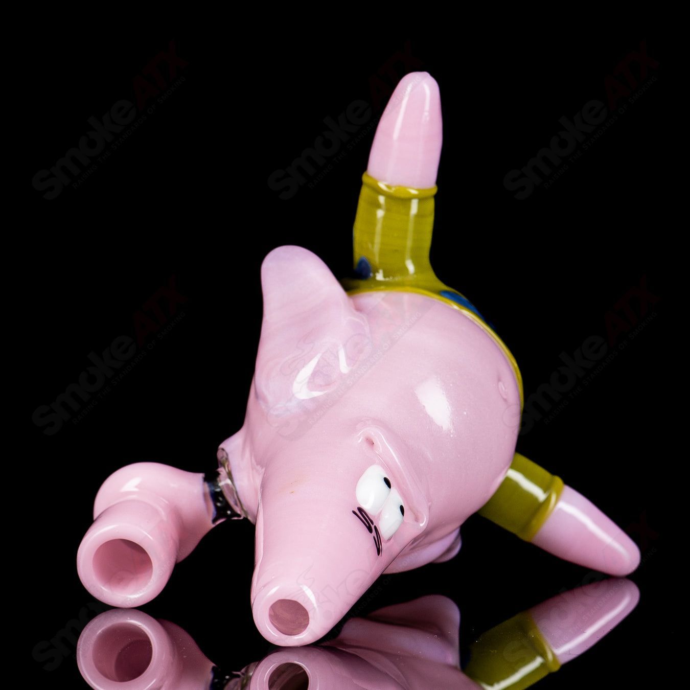 Hendy Patrick Rig glass concentrate rig with intricate design, clear glass body, and colorful accents for dabbing concentrates.