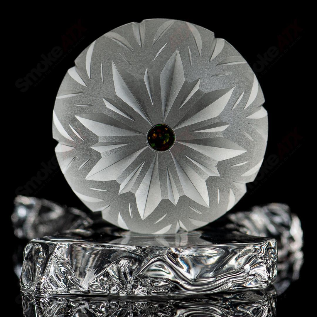 Faceted Snowflake Marble by Fatal Facets, heady glass marble with intricate snowflake design, vibrant colors, and clear glass finish.