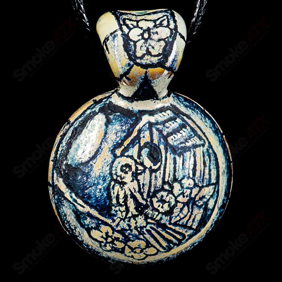 Heady Glass pendant by Calmbo x Trevy Metal featuring a unique, artistic design with vibrant colors and intricate glasswork.