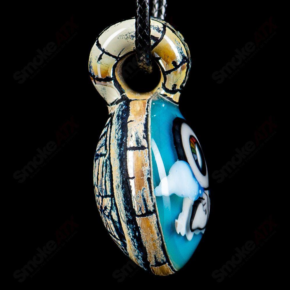 Calmbo x Trevy Metal Heady Glass Pendant featuring intricate glasswork and a sleek metal design for stylish jewelry.