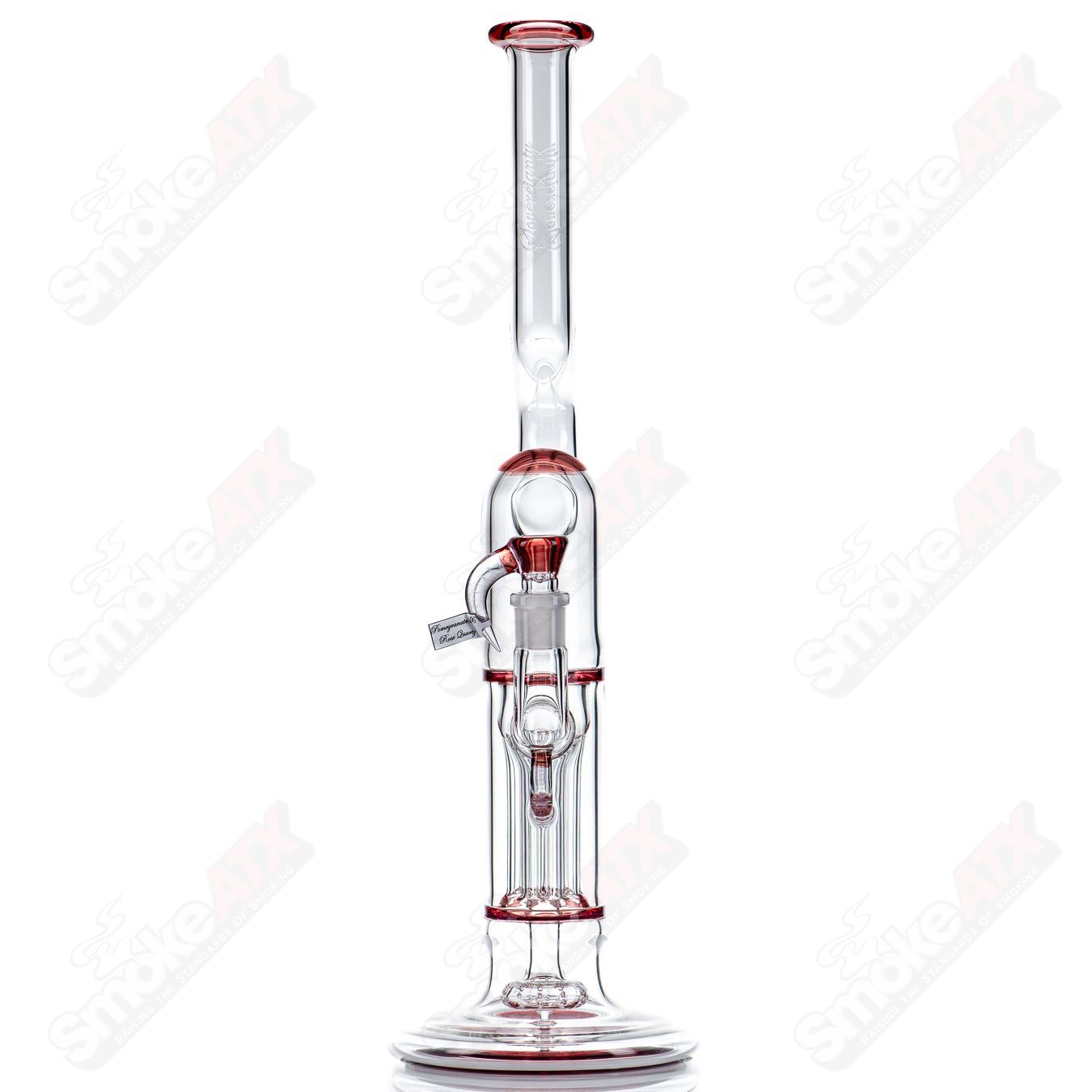 Heady glass piece by Sovereignty Glass featuring a pillar Natty neck design, hollow foot, full accents, and accented seals.