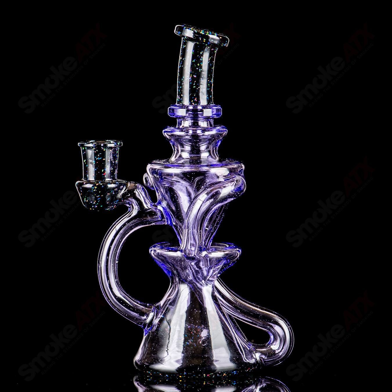 Pink and crushed opal mini recycler concentrate rig by Captn Chronic, featuring colorful glass design and intricate details.