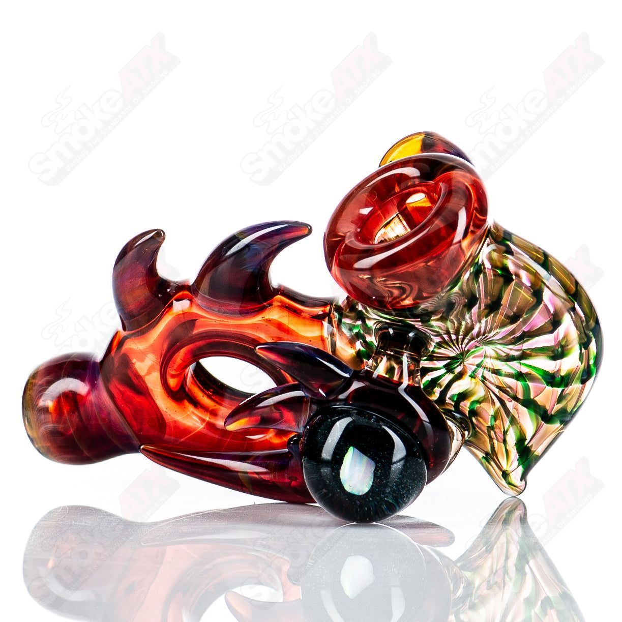Dosh Glass Piranha Hand Pipe made of colorful heady glass with a detailed piranha fish design.