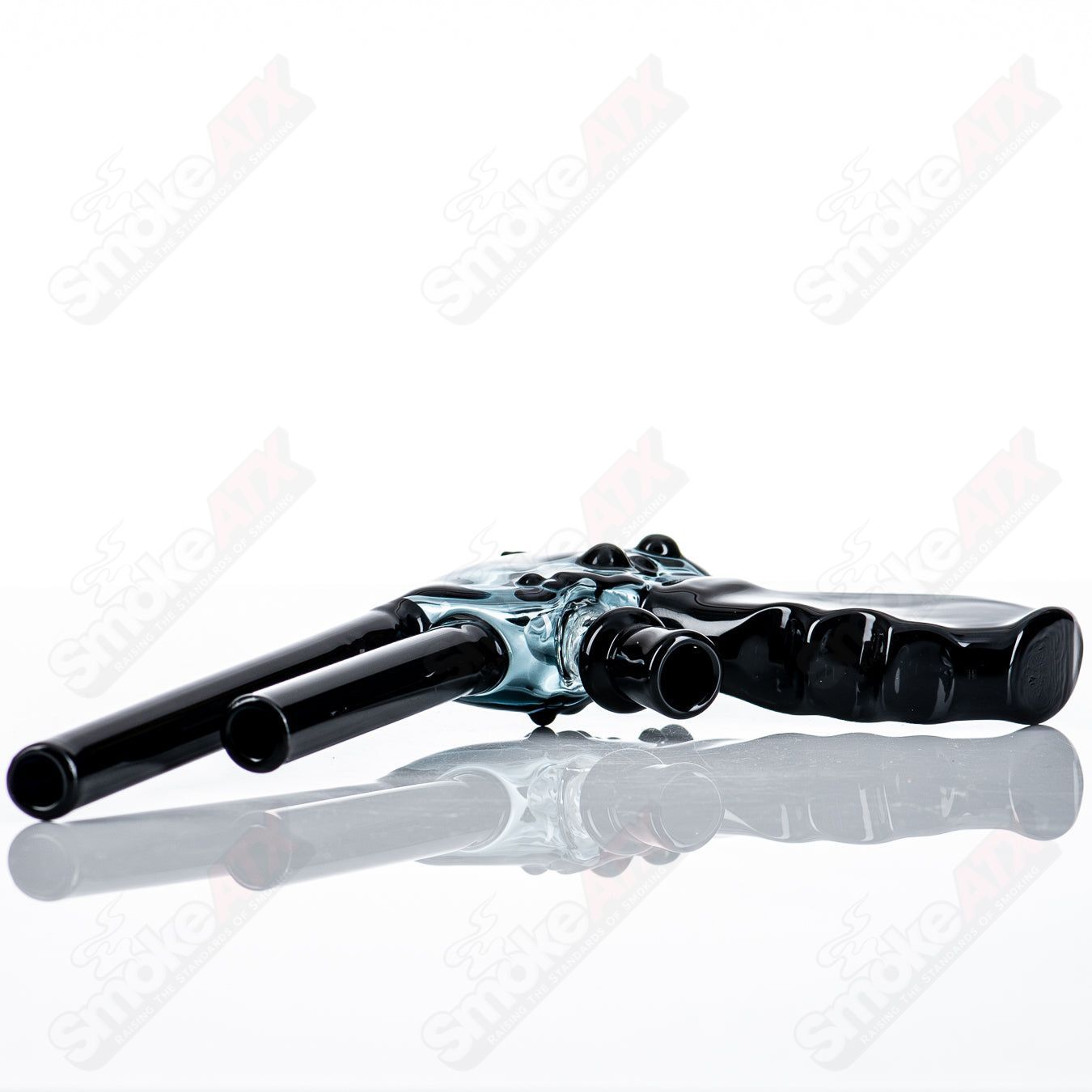 JMass Pistol Rig 2013, a Heady Glass concentrate rig featuring a pistol-shaped design with vibrant glasswork.