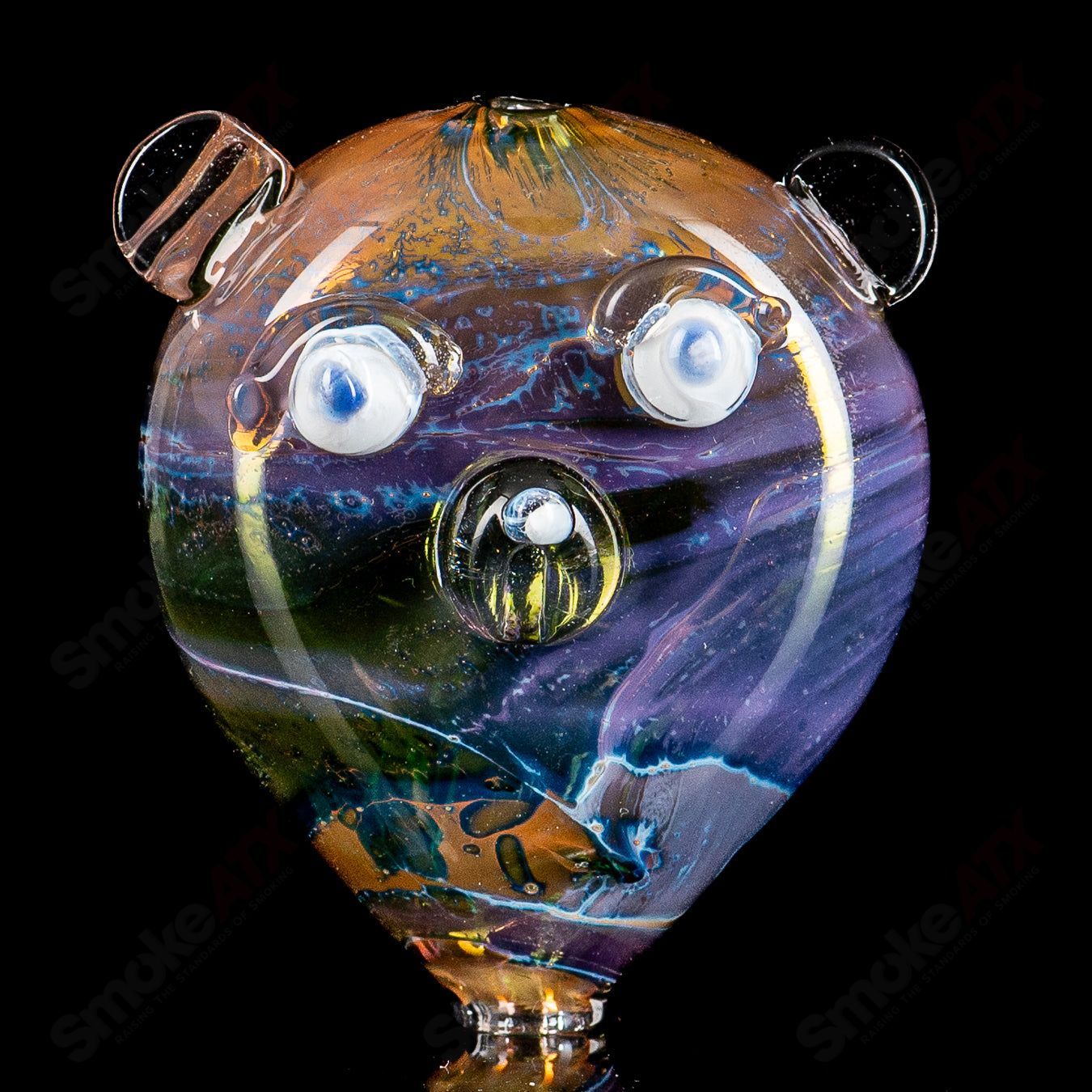 Clear #8 Cat Head pipe glass by Nobody, featuring detailed cat head design, smooth glass surface, and compact pipe shape.