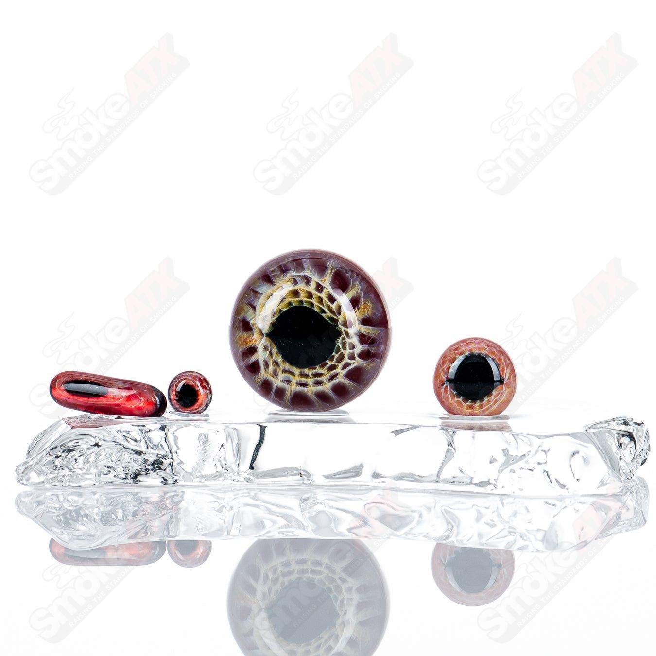 Pomegranate Eye Slurper Set by Indo Glass, glass accessories with vibrant pomegranate design and detailed eye motifs.
