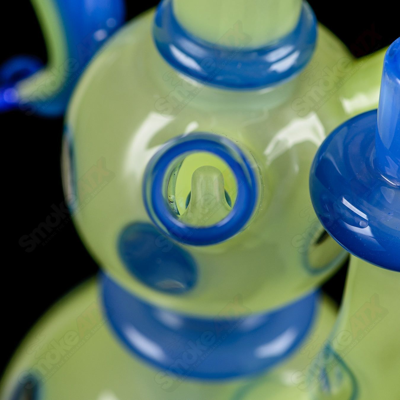 RAM Porthole Xhalerator concentrate rig by Robert Mickelsen, featuring intricate heady glass design and distinctive porthole details.