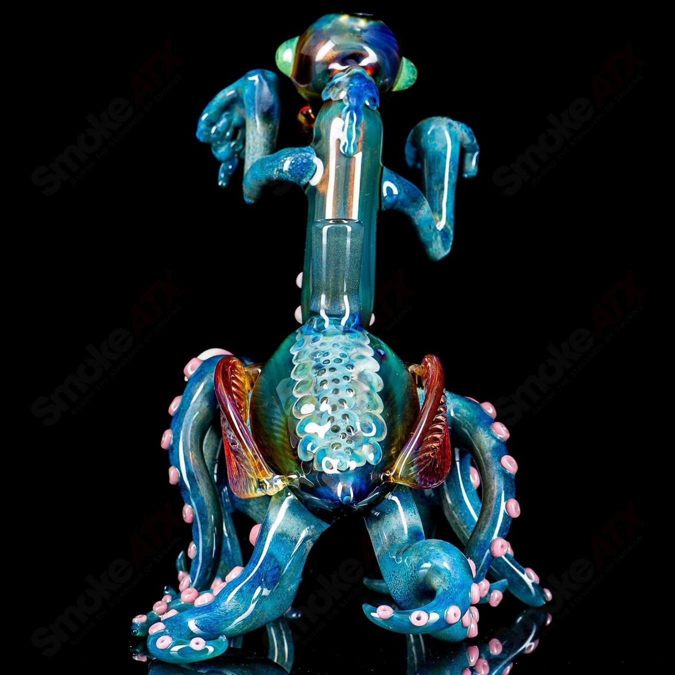 Salt Glass Praying Mantis Rig Burtoni x SALT, a detailed heady glass concentrate rig with a praying mantis design.