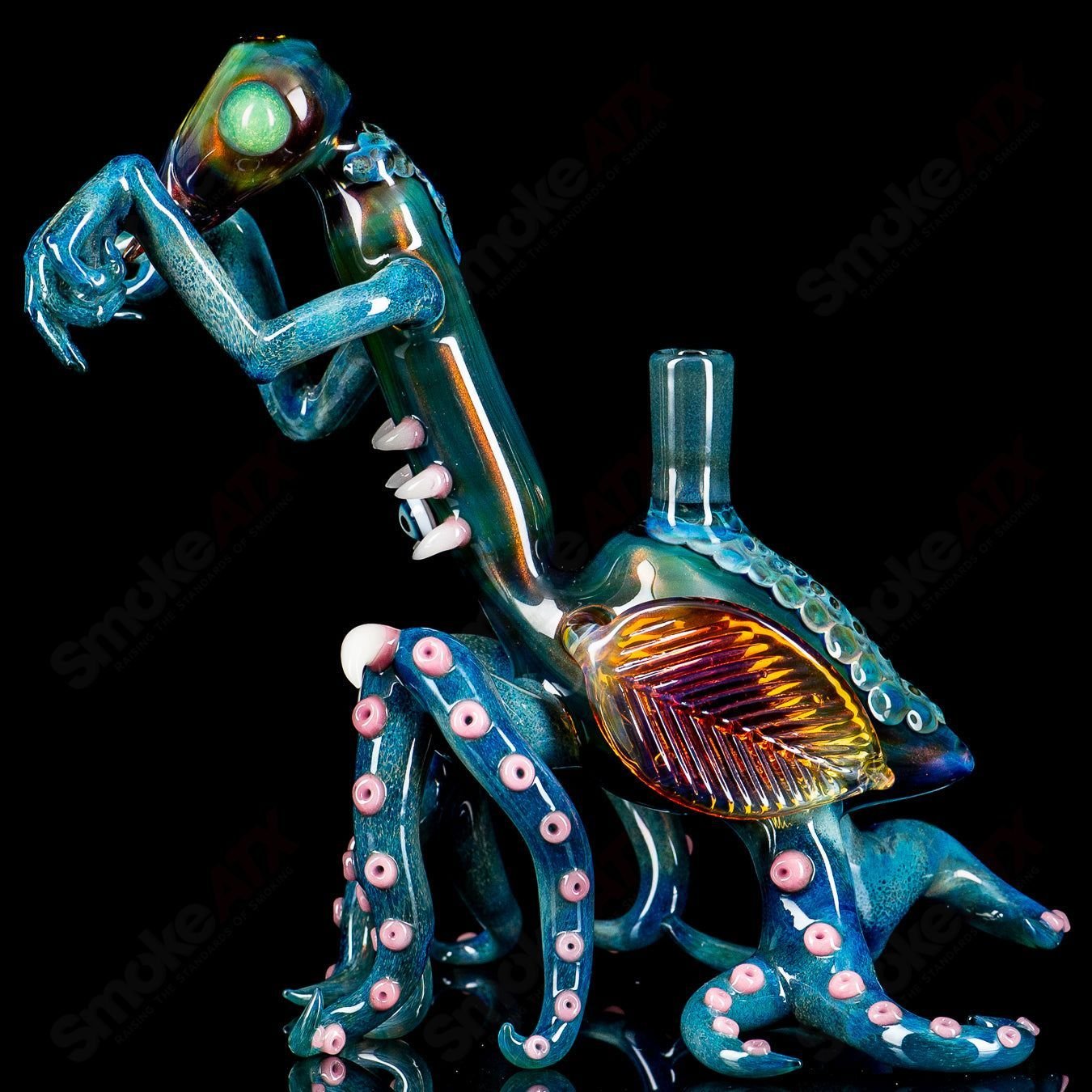 Salt Glass Praying Mantis Rig Burtoni X SALT, heady glass concentrate rig with detailed praying mantis design.