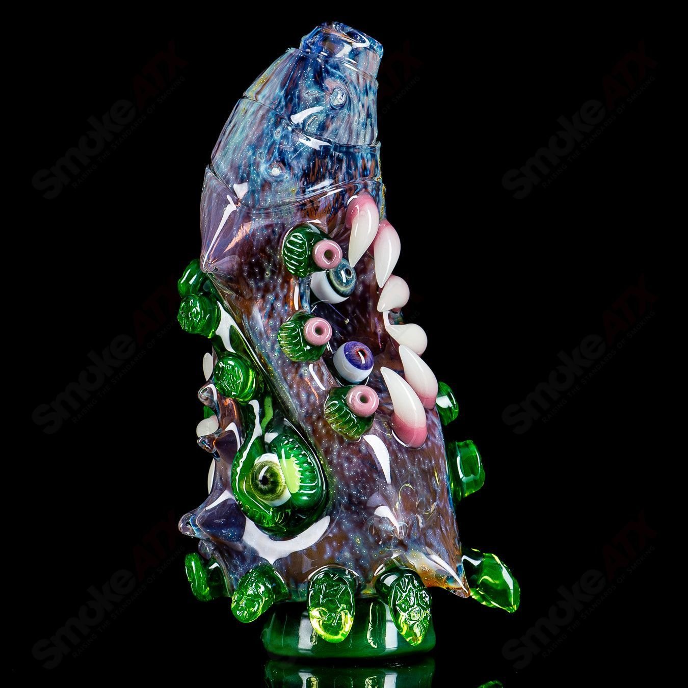 Heady glass Puffco top by Nobody Glass x SALT, featuring colorful, artistic glass design for Puffco devices.