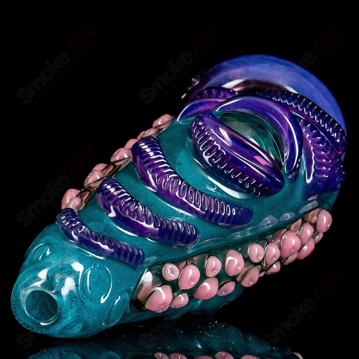 Salt Glass Puffco Top, a heady glass accessory for Puffco devices, featuring intricate glasswork and vibrant colors.