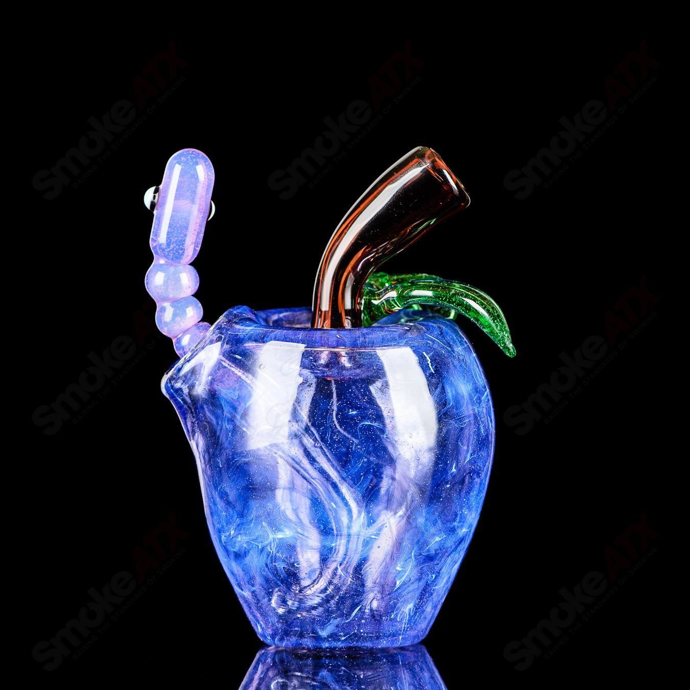 Purple Apple Rig by Pouch Glass with worm dabber and pouch, featuring vibrant purple glass and intricate design for concentrates.