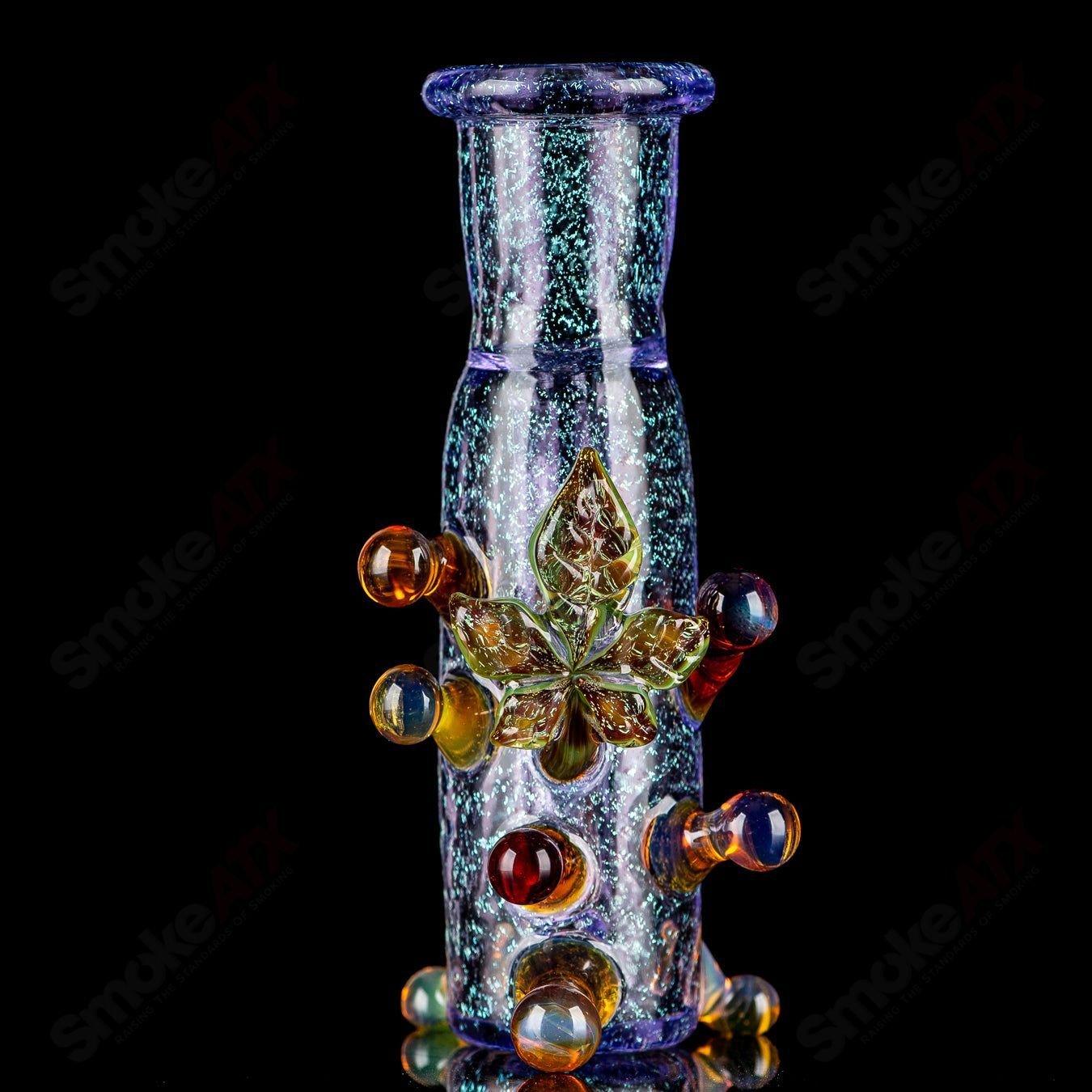Purple dichro ash catcher with UV leaf design from Mr. Gray heady glass collection, showcasing vibrant colors and intricate details.