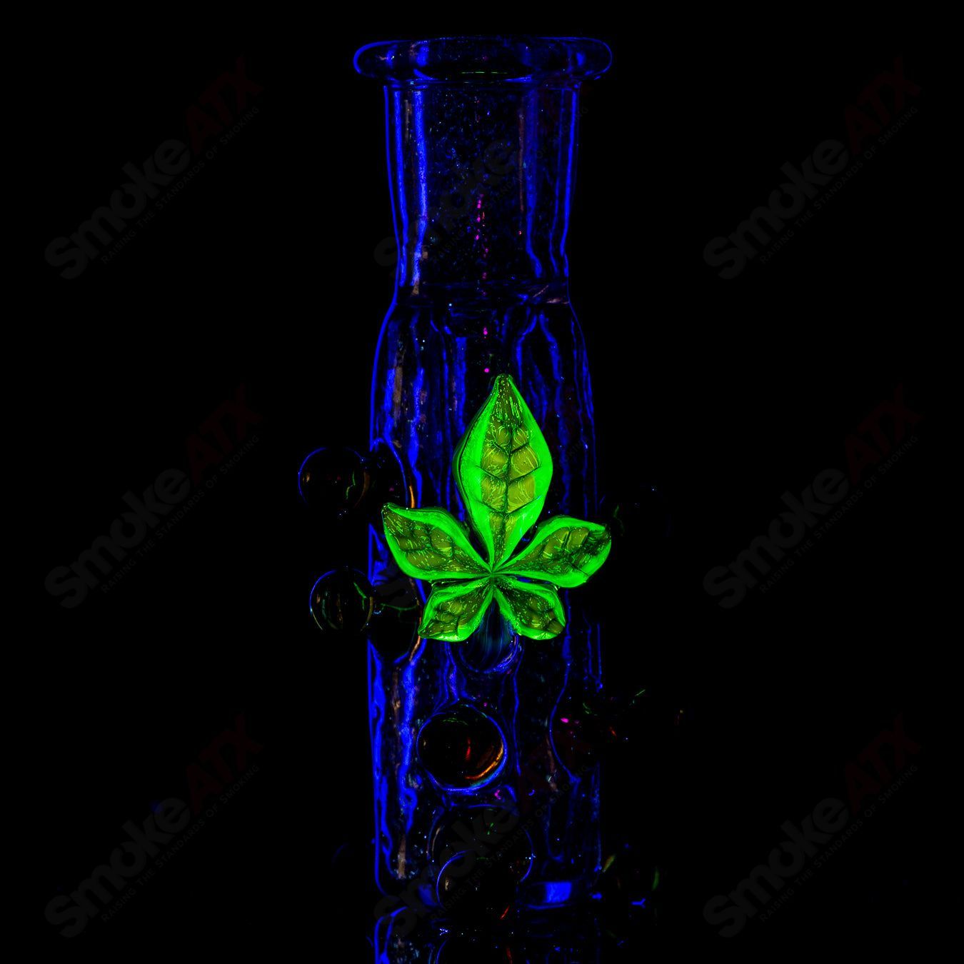 Purple dichro ash catcher with UV leaf design by Mr. Gray, heady glass accessory for water pipes and bongs.