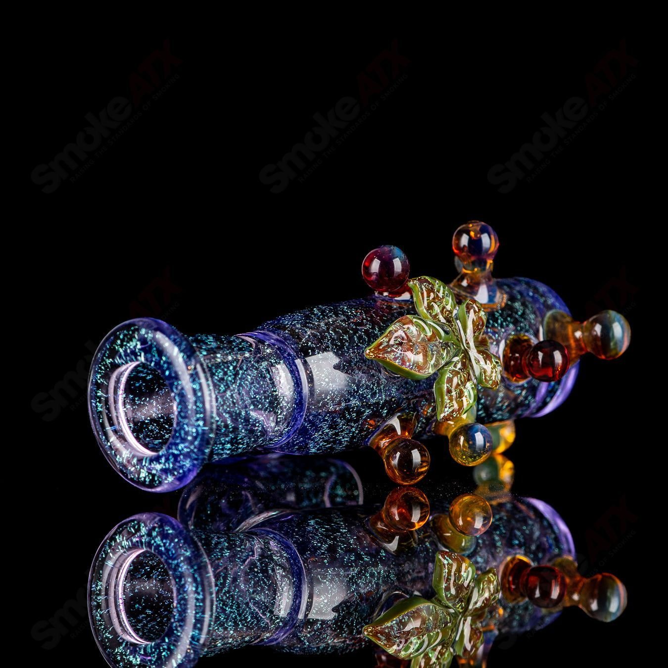 Purple dichro ash catcher with UV leaf design from Mr. Gray, heady glass accessory for enhancing smoking experience.