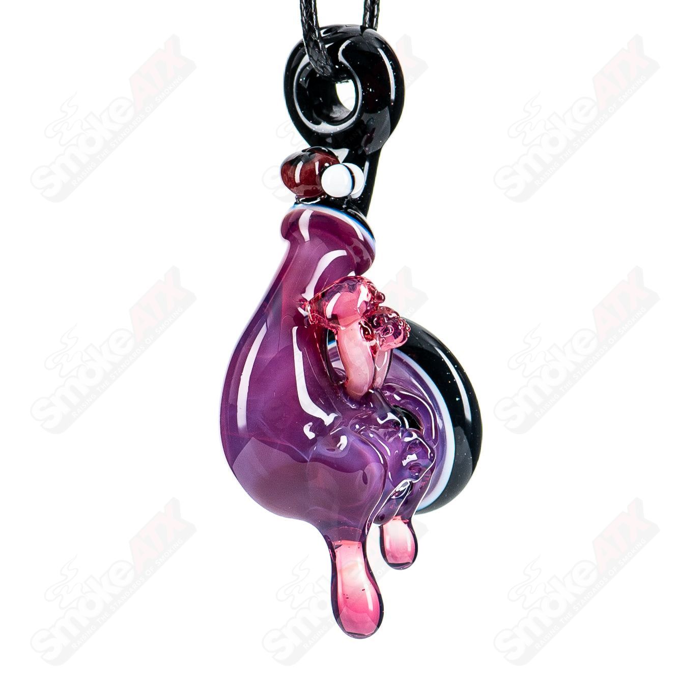 Purple Wook Sherlock pendant by Blu Sun x JMass, handcrafted heady glass jewelry with intricate design and vibrant purple color.