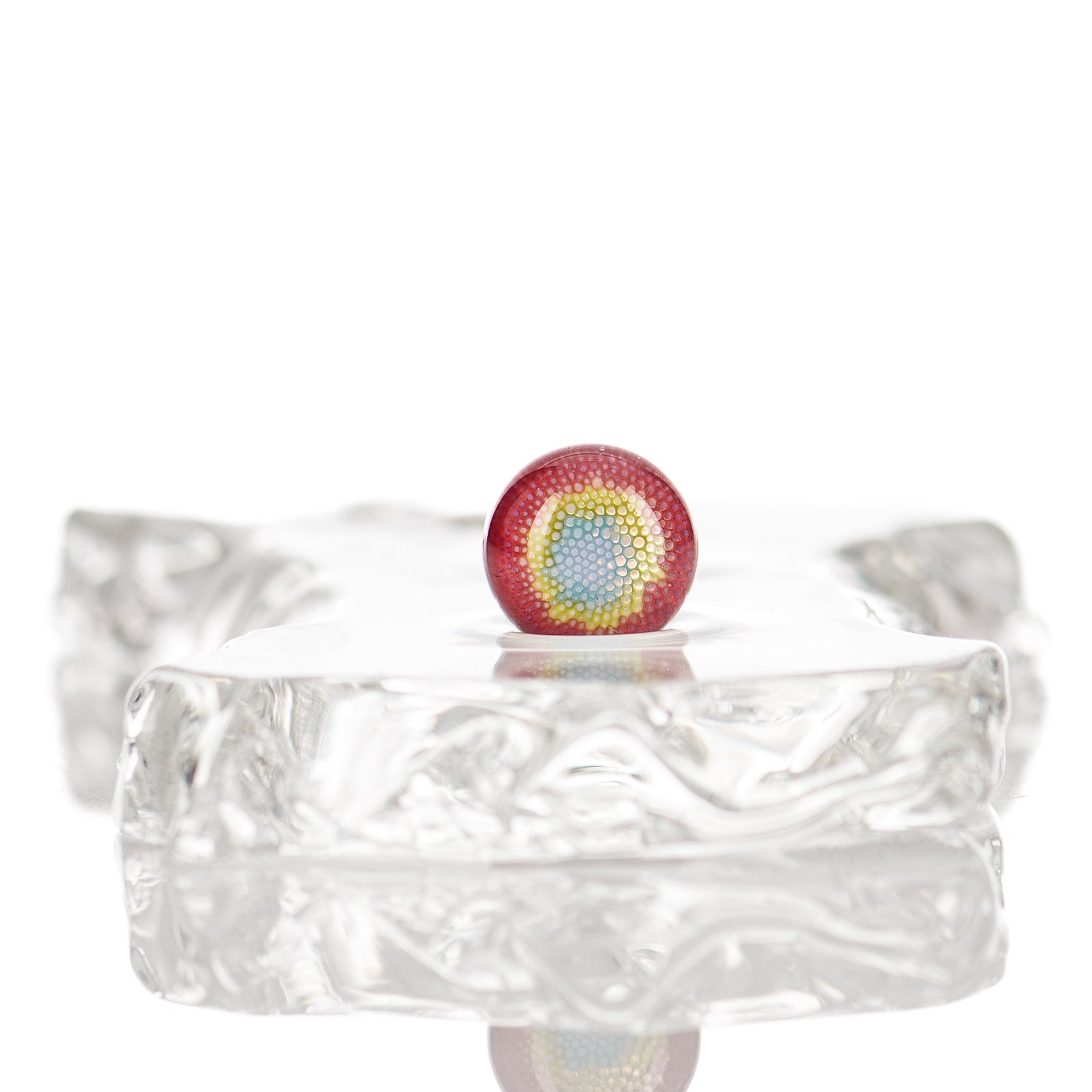 Dosa Glass Valve Dosa Glass featuring pearls and inserts, clear glass with decorative elements, showcasing elegant design.