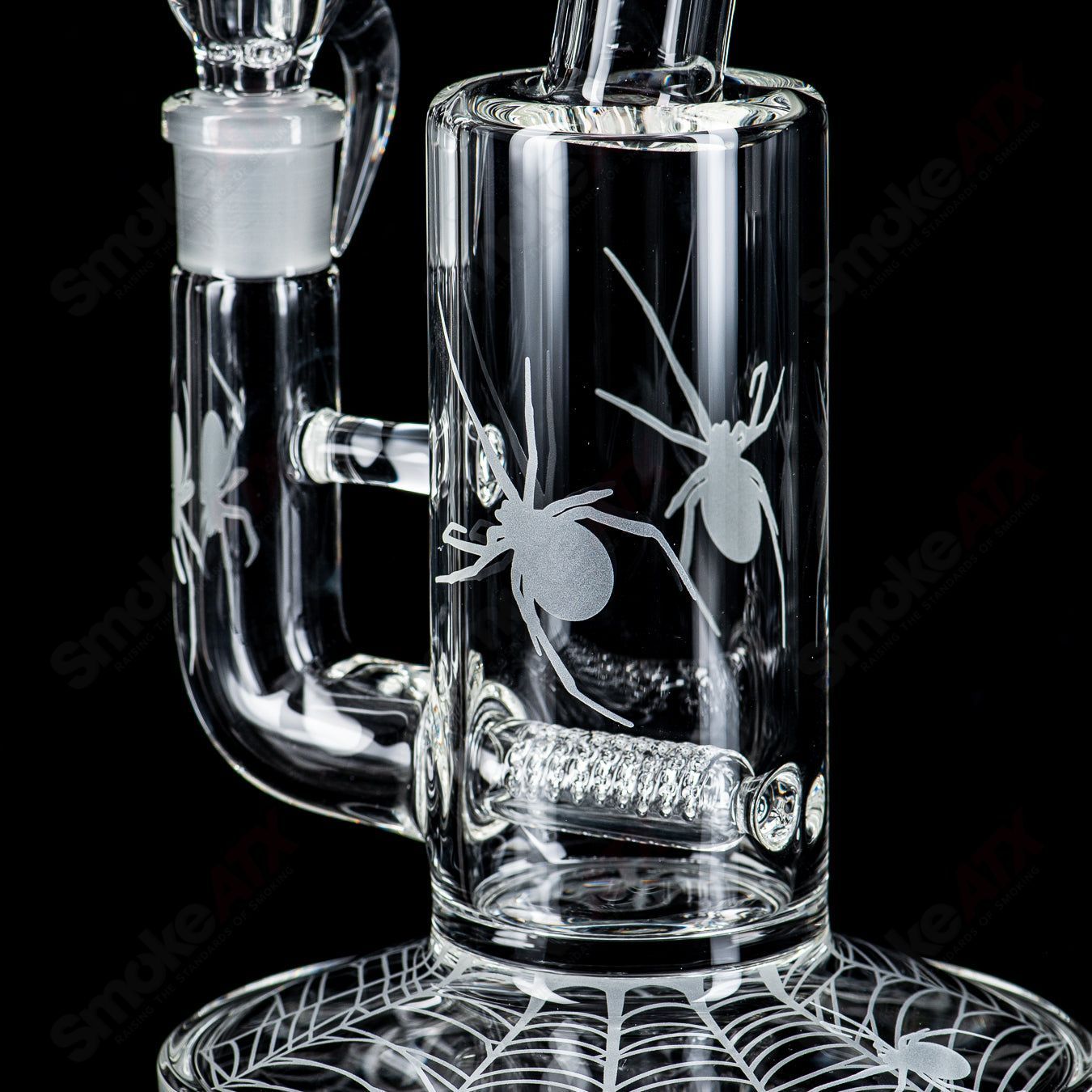 Sovereignty Glass Queen Stemline clear straight tube with bent neck and Halloween pattern design, showcasing intricate glasswork.