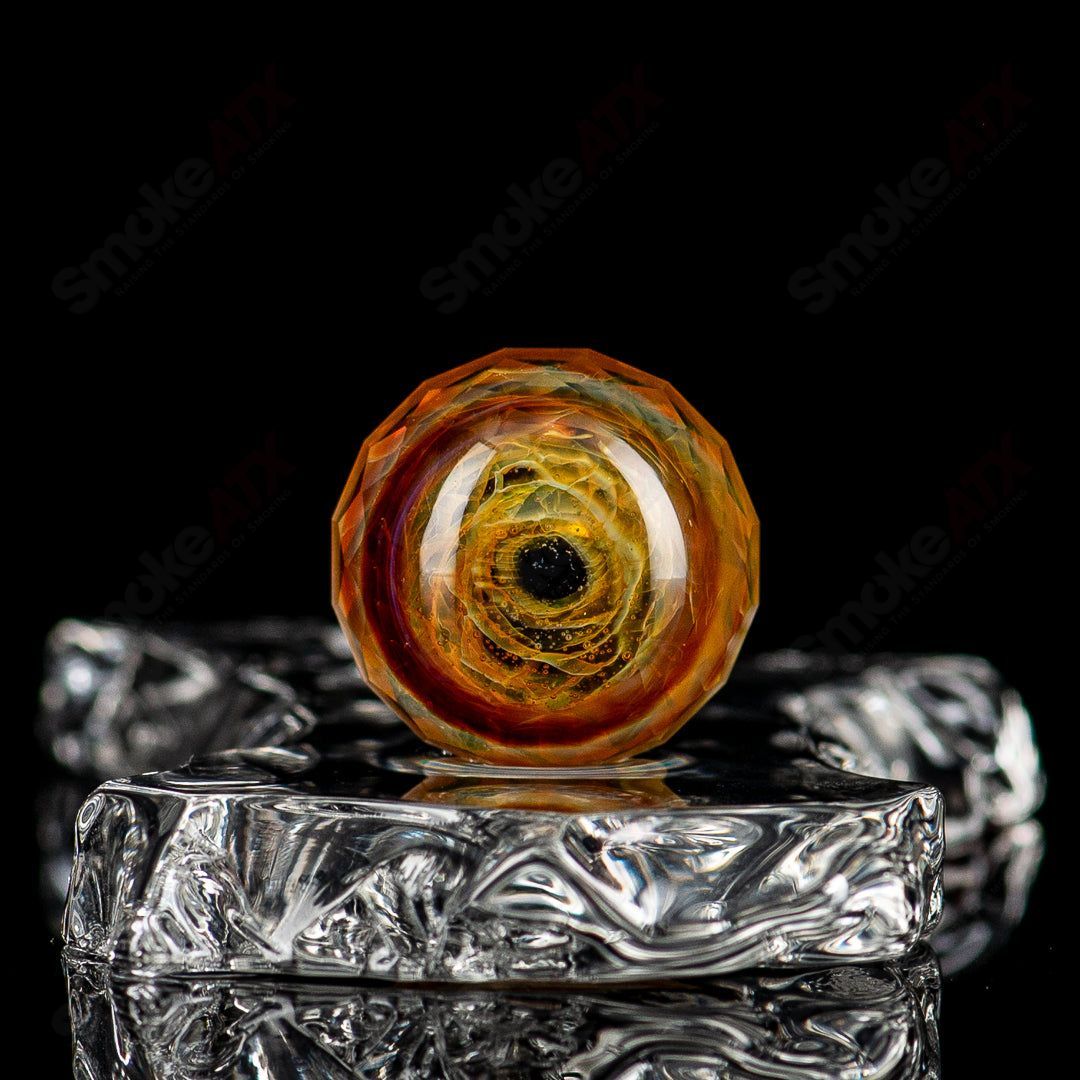 Colorful Indo Marble Fatal Facets heady glass marble with intricate patterns, featuring vibrant hues and detailed design.