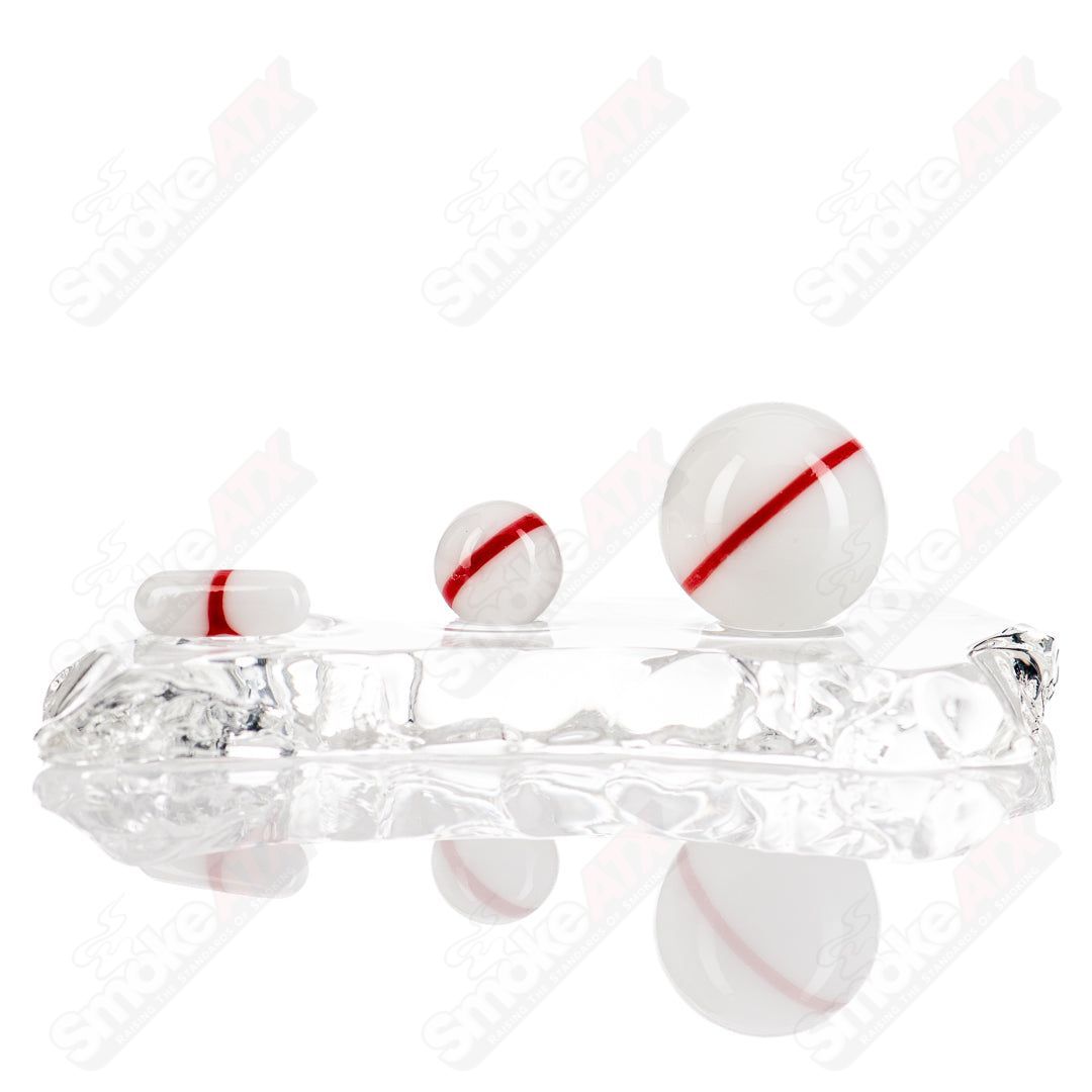 Three-piece Ganja Grimmlin Glass Pokeball terp slurper set with colorful glass design for dabbing concentrates.