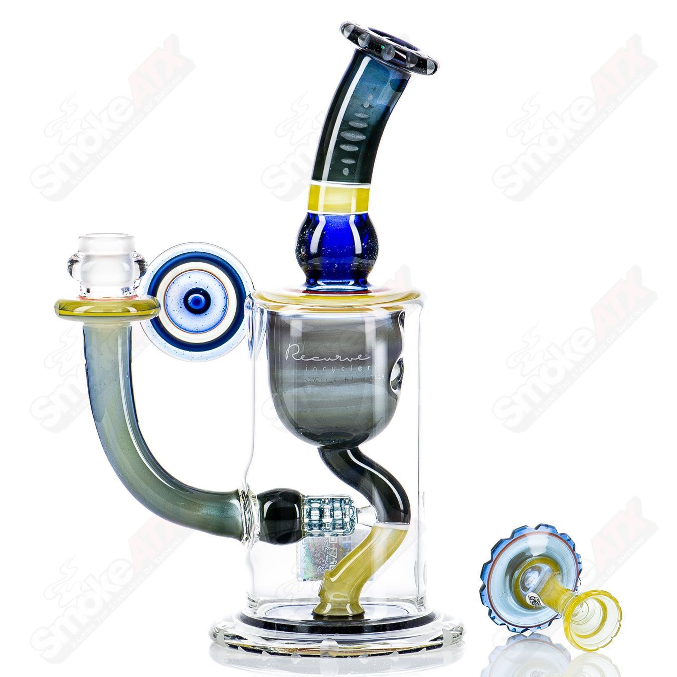 Mobius Recurve Circle Solo #6 of 2024 Heady Glass Bubbler with intricate glasswork and a circular design.
