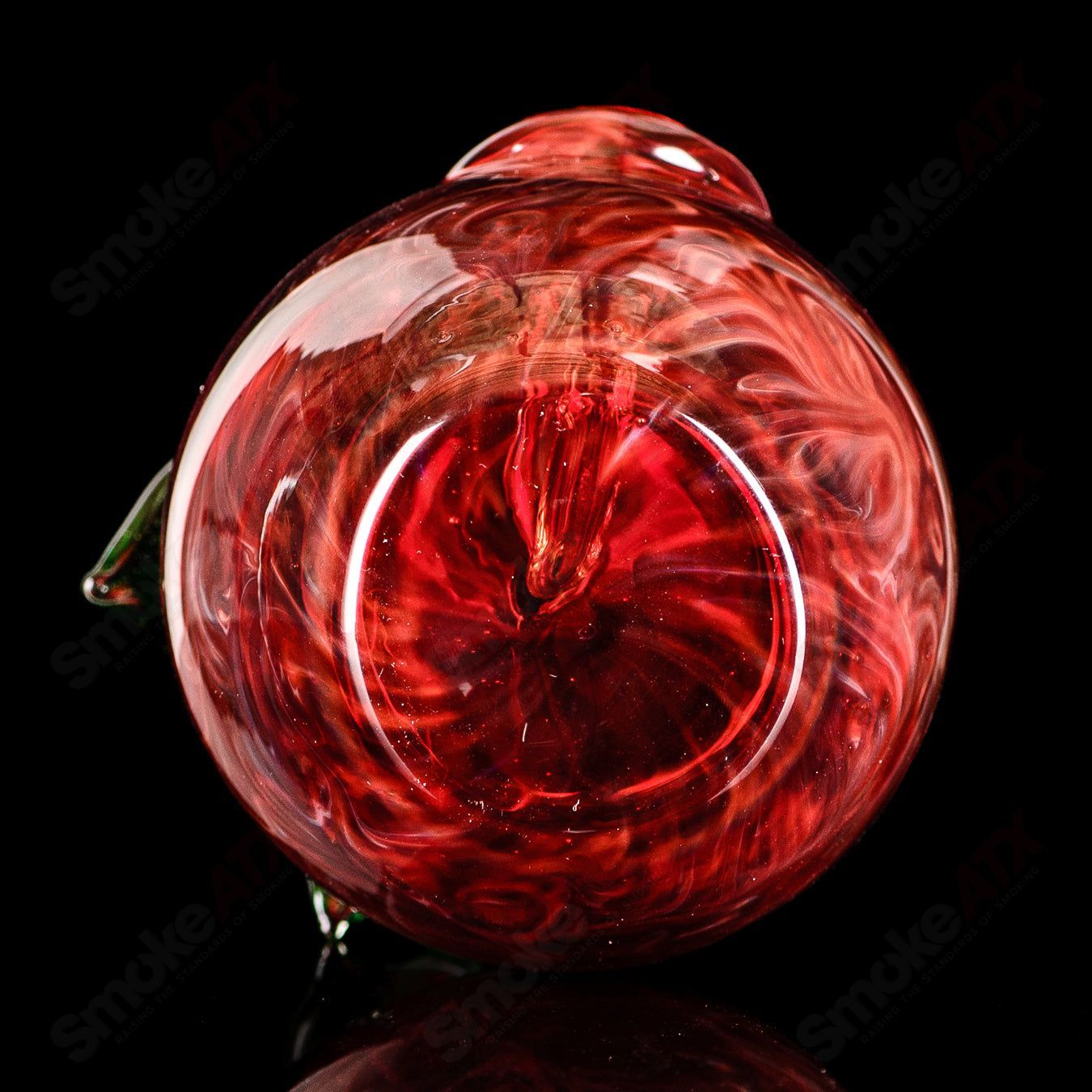 Red Apple Rig by Pouch Glass with worm dabber, made of clear glass, featuring a vibrant red apple design and a matching pouch.