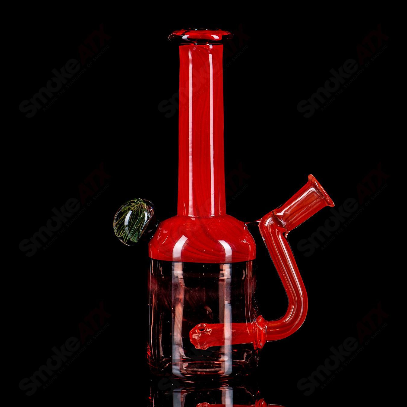 Red Bell Rig with Fume Marble by Kate B, a colorful glass concentrate rig featuring a red bell shape and intricate fume marble detail.