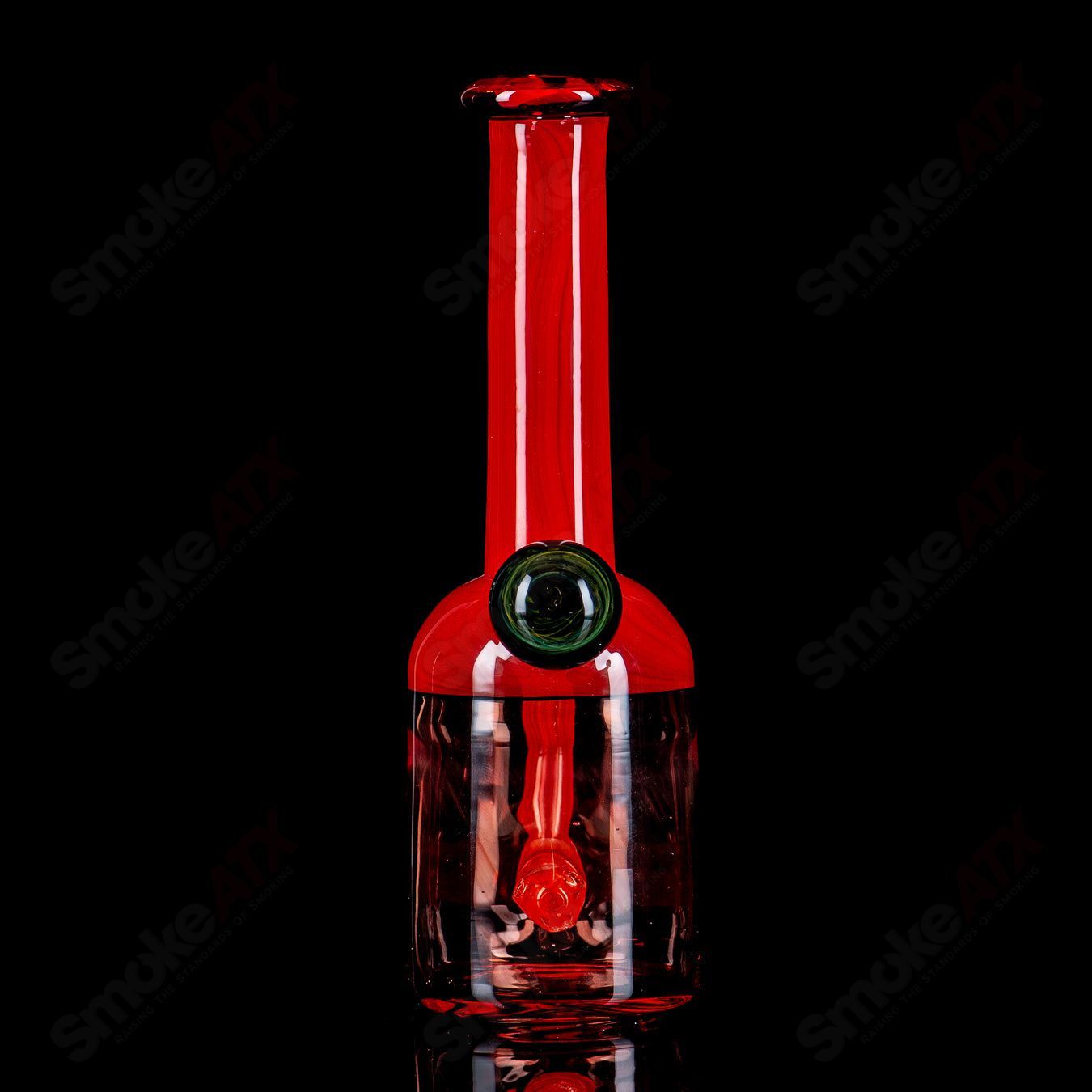 Red Bell Rig with fume marble by Kate B Glass, a colorful glass concentrate rig featuring a vibrant red bell shape and decorative marble.