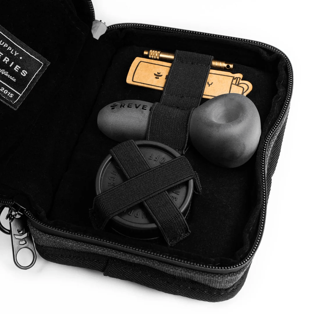 Revelry The Pipe Kit soft smell-proof case with multiple compartments for storing smoking accessories and pipes.