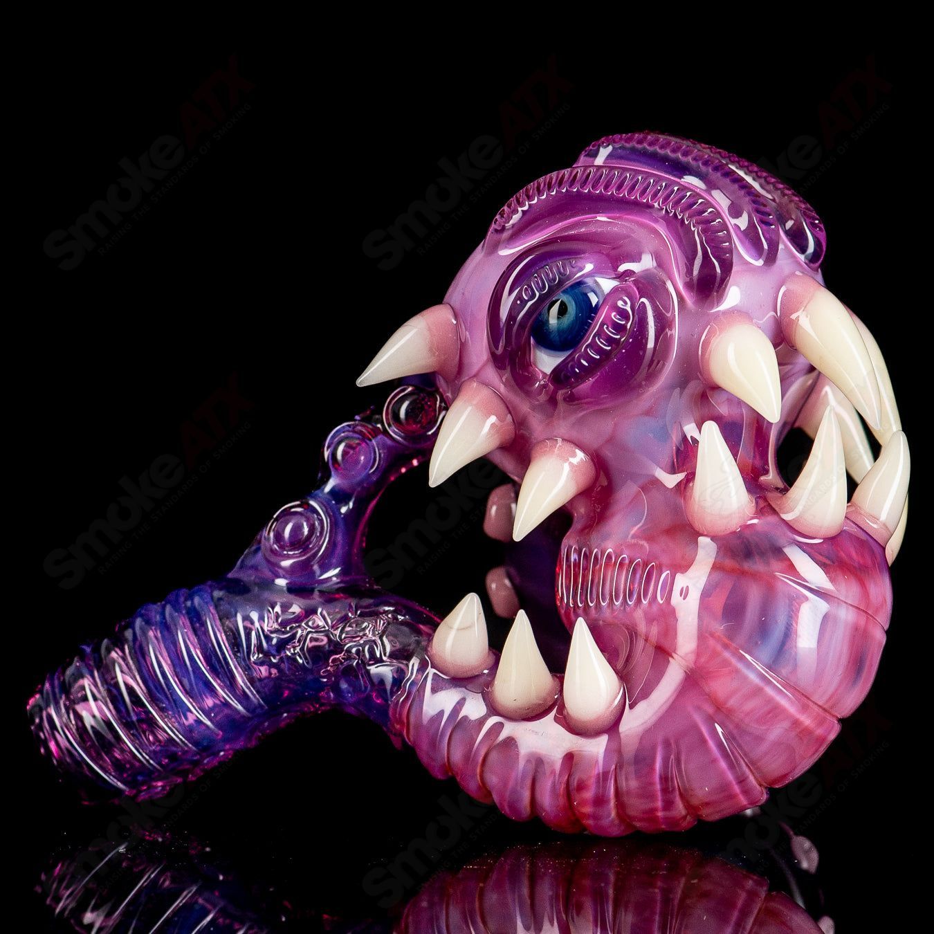 Royal jelly Quasar Sherlock glass pipe by Salt, features a detailed Sherlock-shaped head and vibrant glass design.