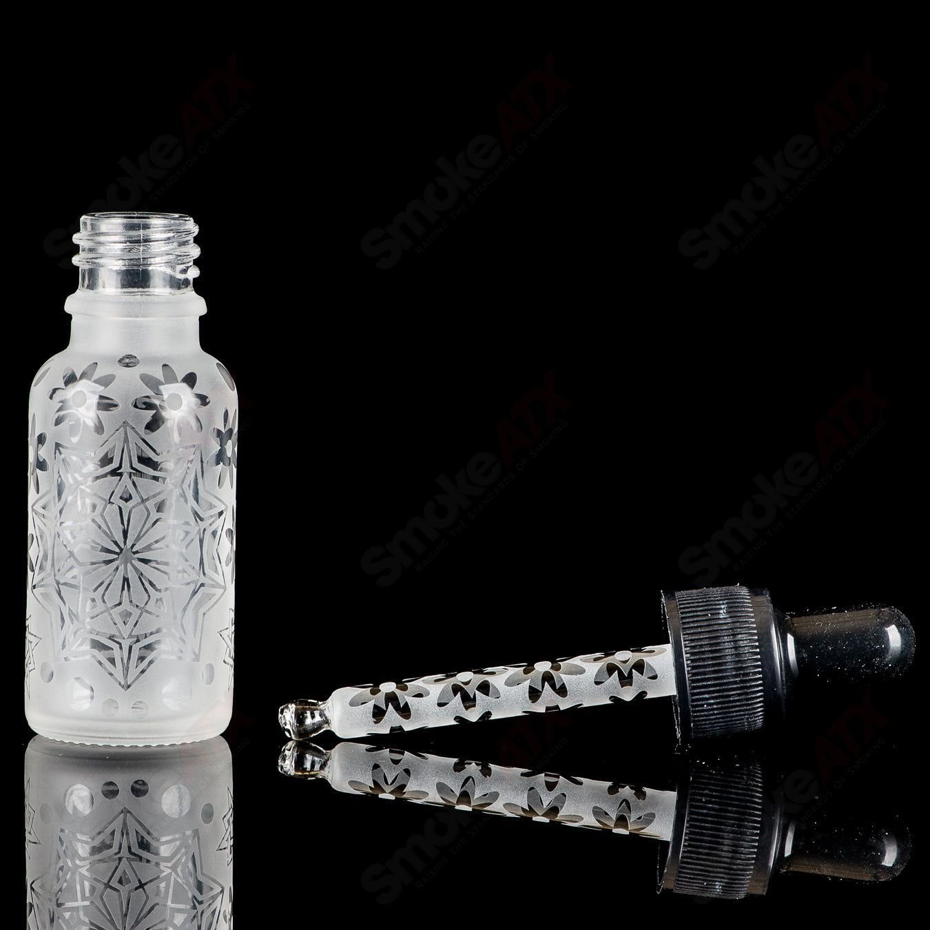 Sandblasted Iso Dropper flask by Fatal Facets, a heady glass piece with intricate frosted design and dropper cap.