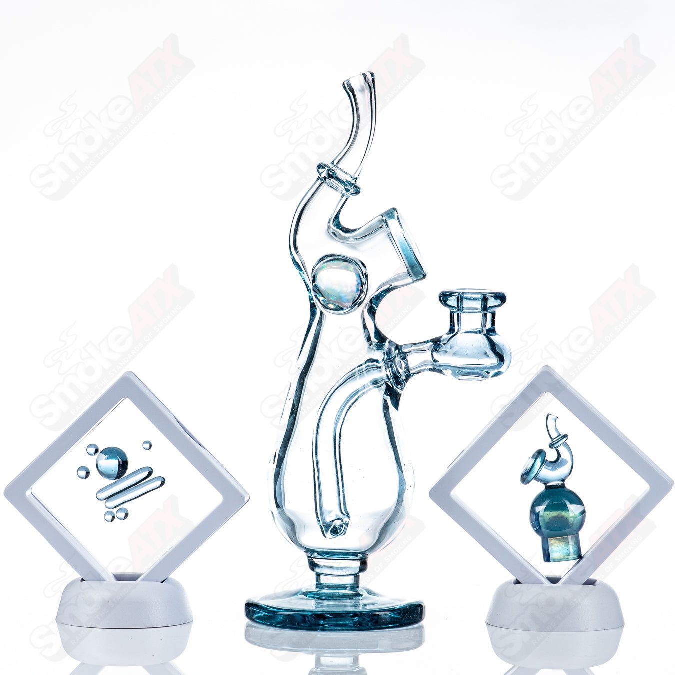 Sherlock Bottle Set by JMass, a heady glass concentrate rig with intricate design and clear glass construction.