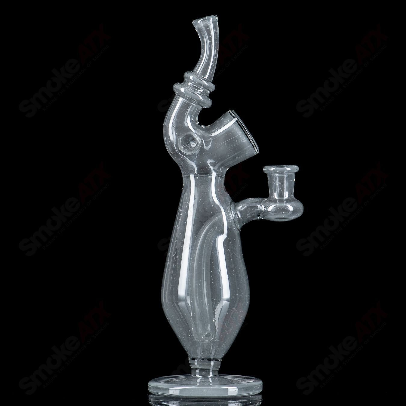 Sherlock W Matching Cap Bottle by JMass, a heady glass concentrate rig with a detailed Sherlock design and matching cap.