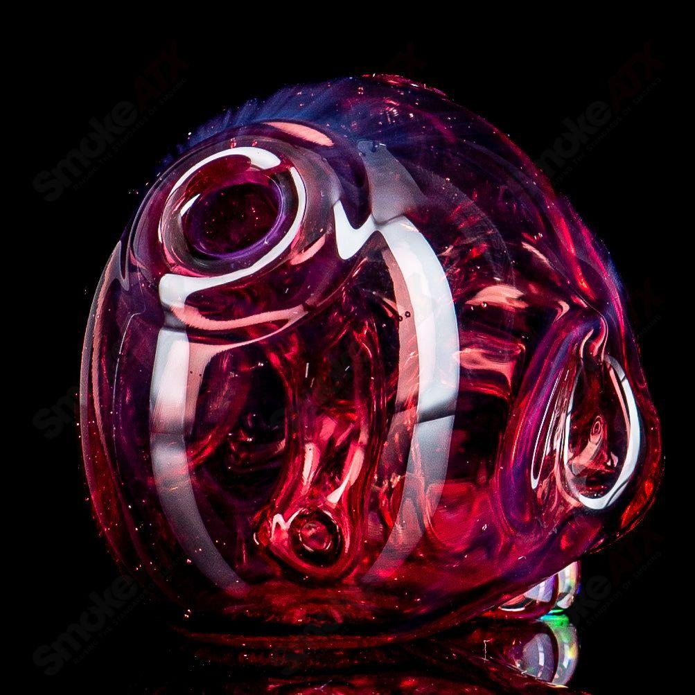 Carsten Carlile Skull Shredder heady glass concentrate rig with a detailed skull design and intricate glasswork.