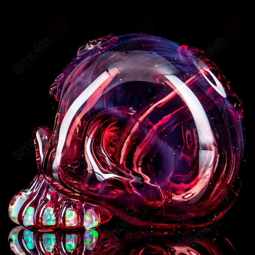 Carsten Carlile Skull Shredder Heady Glass concentrate rig with a detailed skull design and vibrant colors for dabbing.