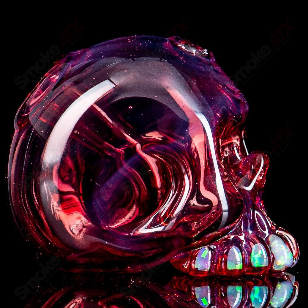 Carsten Carlile Skull Shredder Heady Glass concentrate rig with a detailed skull design for dabbing and vaporizing concentrates.