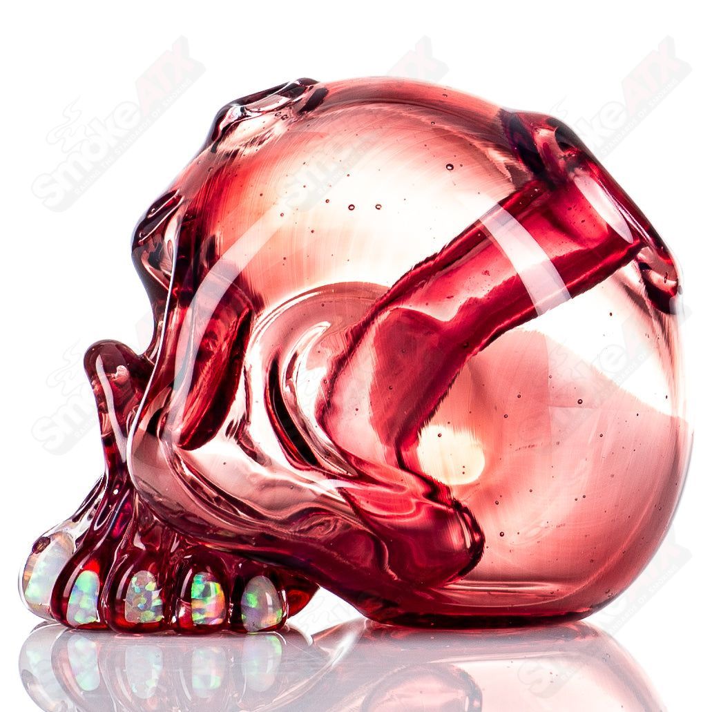 Carsten Carlile Skull Shredder heady glass concentrate rig with a detailed skull design, showcasing intricate glasswork and artistic craftsmanship.