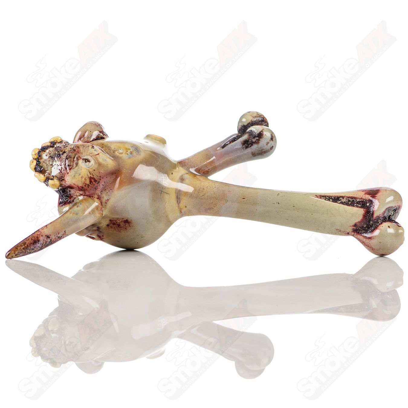 Ghost Glass Skull Spoon Ghost Glass hand pipe with a detailed skull design, crafted from clear glass, ideal for smoking enjoyment.