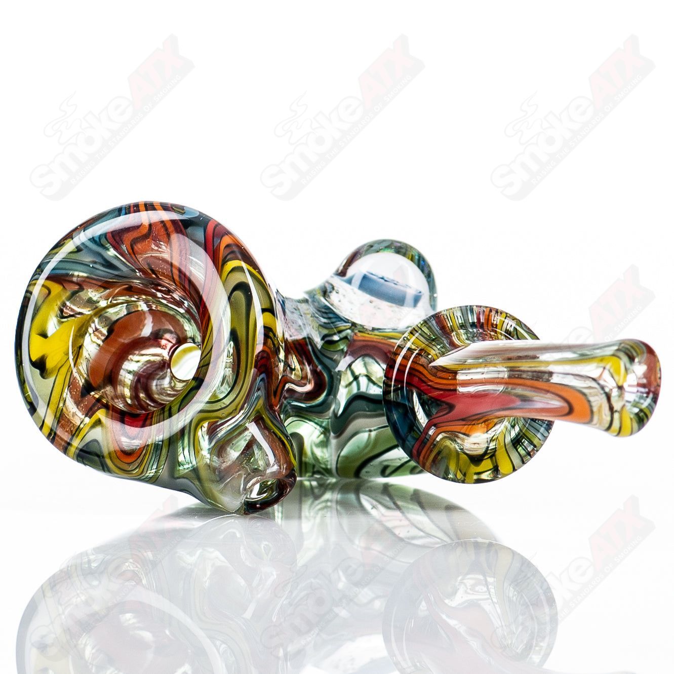 Small color-worked Sherlock puzzle by JMass featuring intricate design and vibrant colors in a compact form.