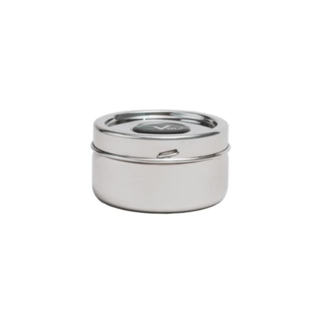 Small C Vault CVault Twist metal jar for storing herbs or concentrates, featuring a secure twist lid and durable metal construction.
