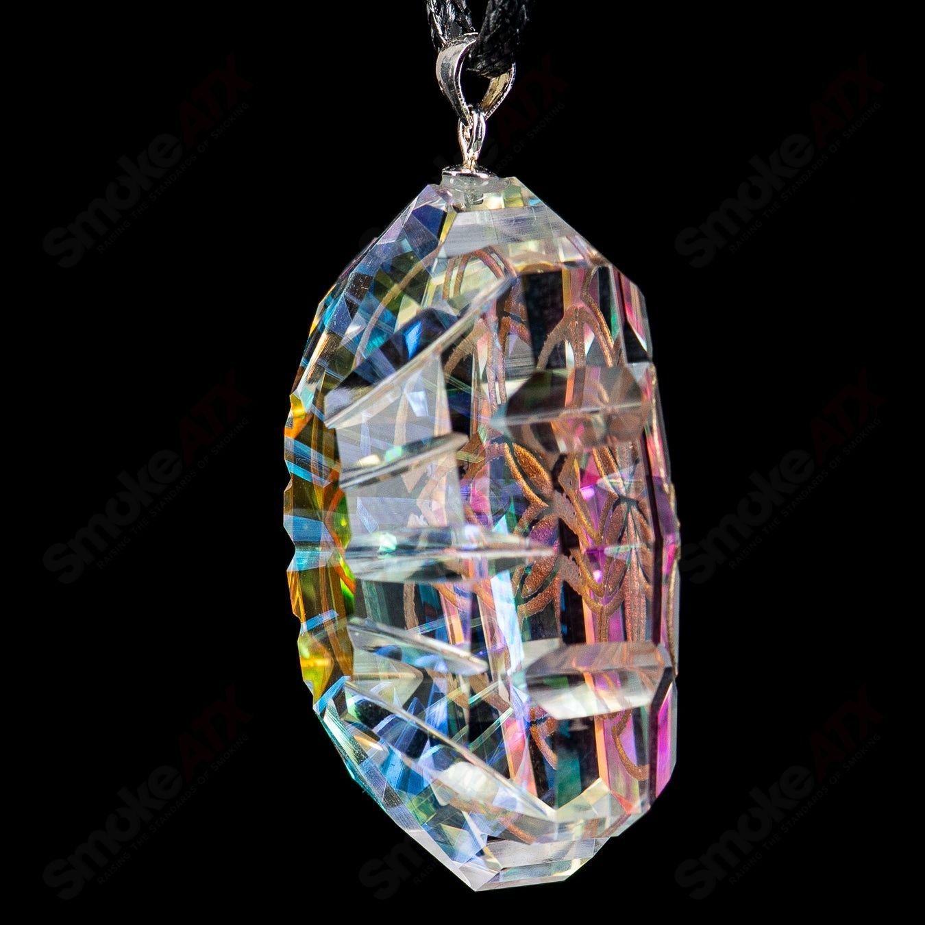 Fatal Facets SOL Pendant made of heady glass with intricate facets and a sleek design, hanging as a stylish pendant accessory.