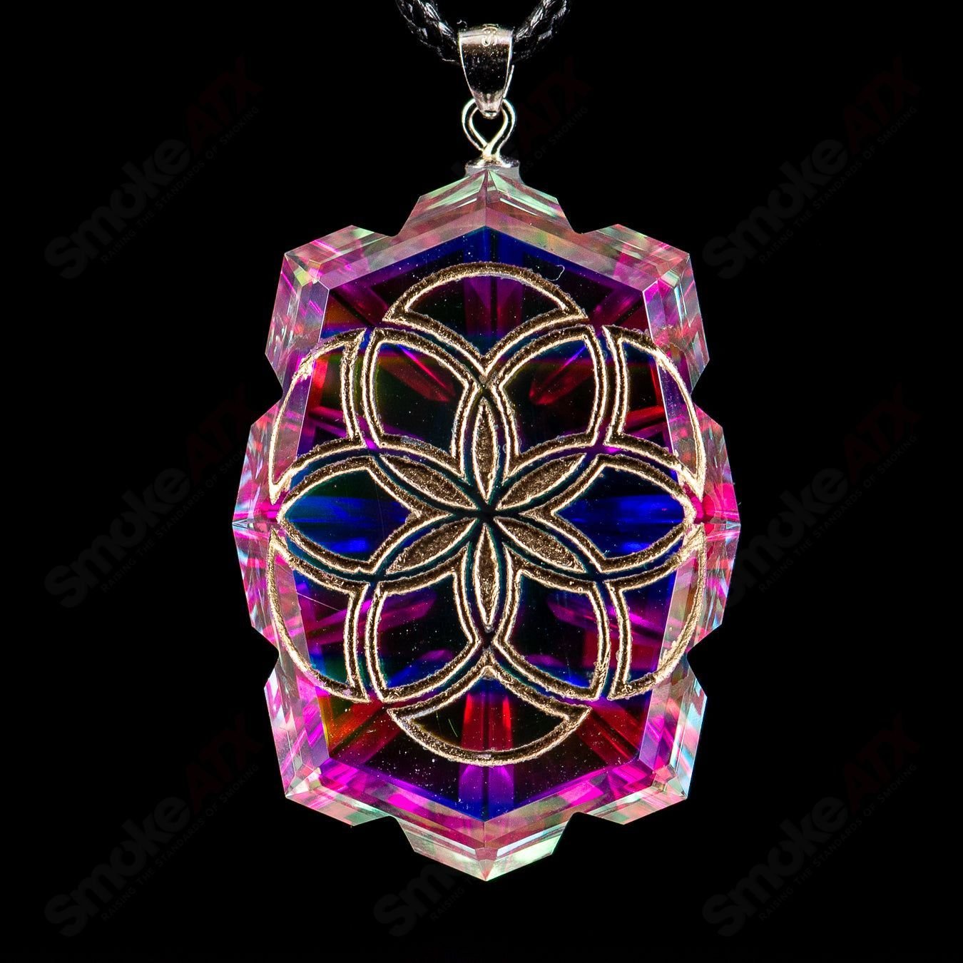Fatal Facets SOL Pendant, a colorful heady glass pendant with intricate facets, hanging from a chain.