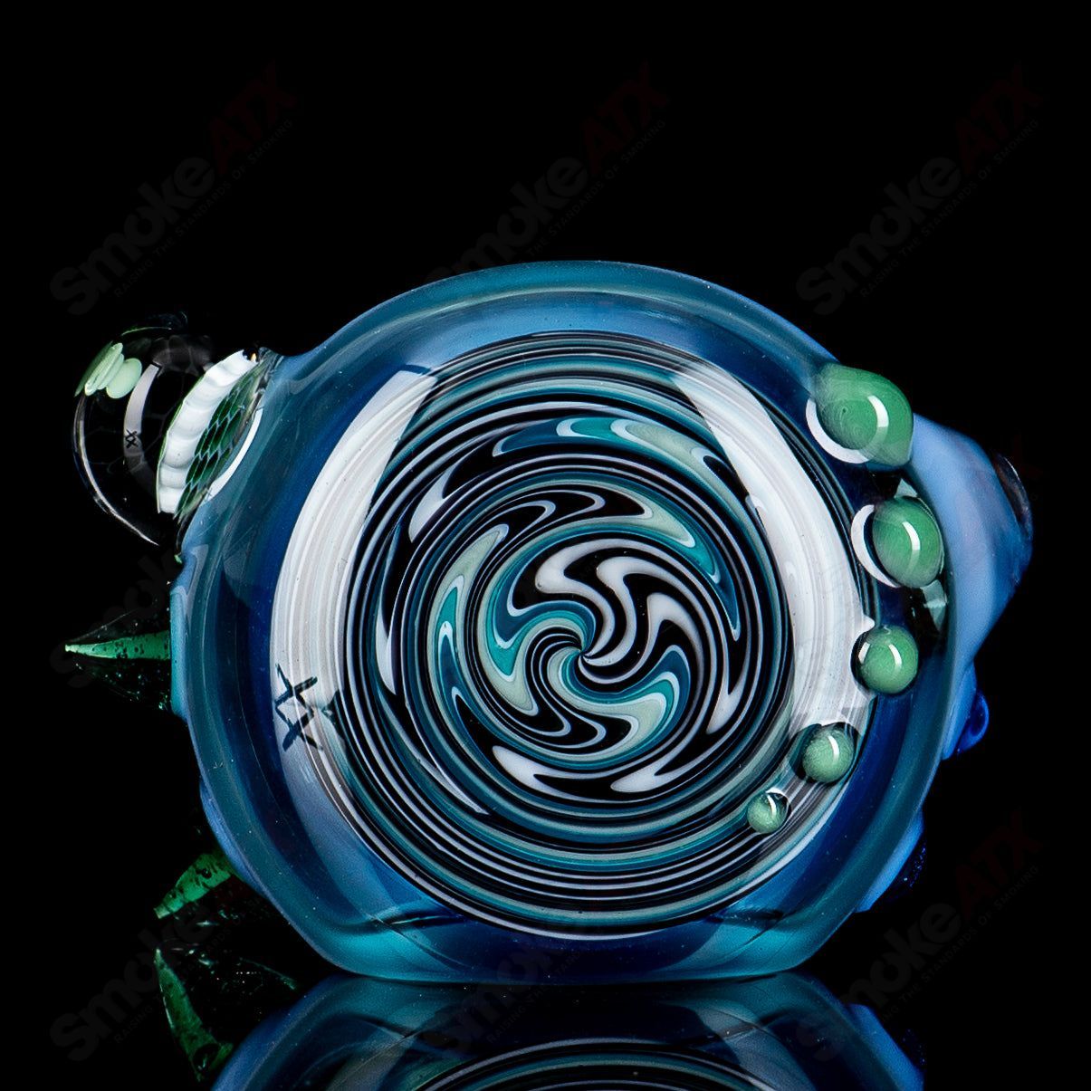 Heady glass spiked spoon hand pipe with honeycomb design by JMass, featuring intricate glasswork and spiked accents.