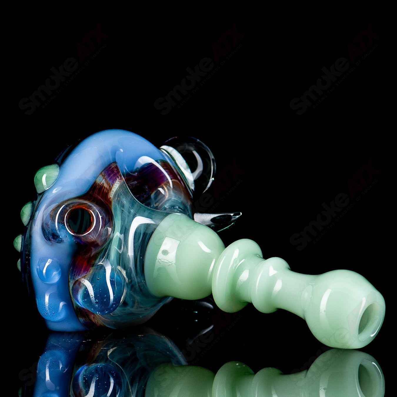 JMass Heady Glass spiked spoon hand pipe with honeycomb design, featuring a textured spiked bowl for enhanced grip and visual appeal.